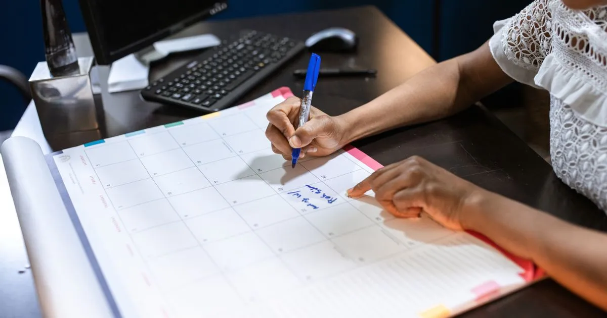 Marking the six-year date bad credit falls off a Canadian credit report on a desk calendar