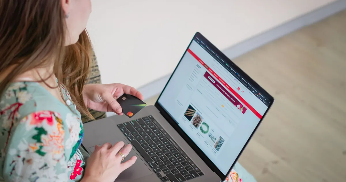 Woman using one of the best secured credit cards in Canada to shop online