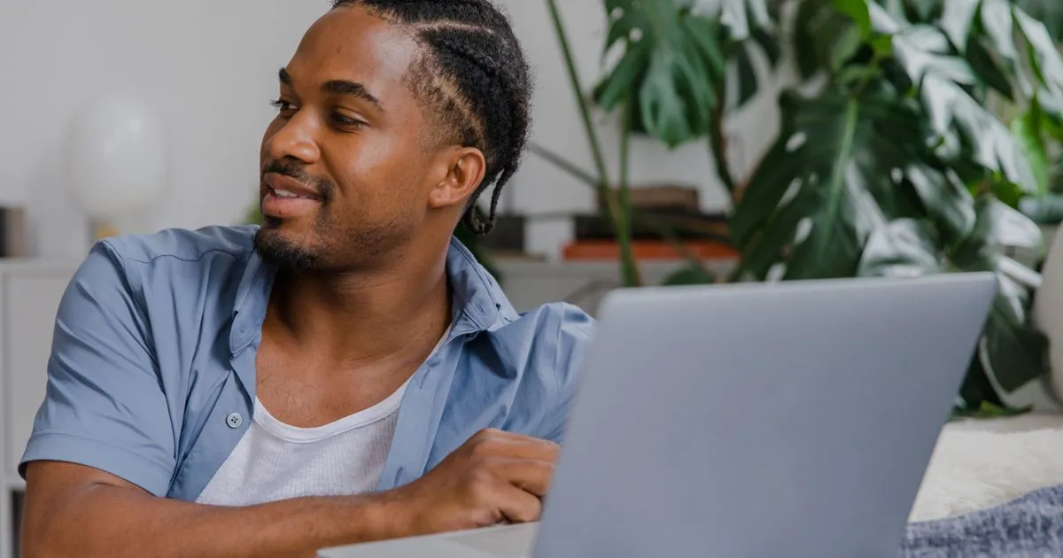 Checking credit repair progress on a laptop at home