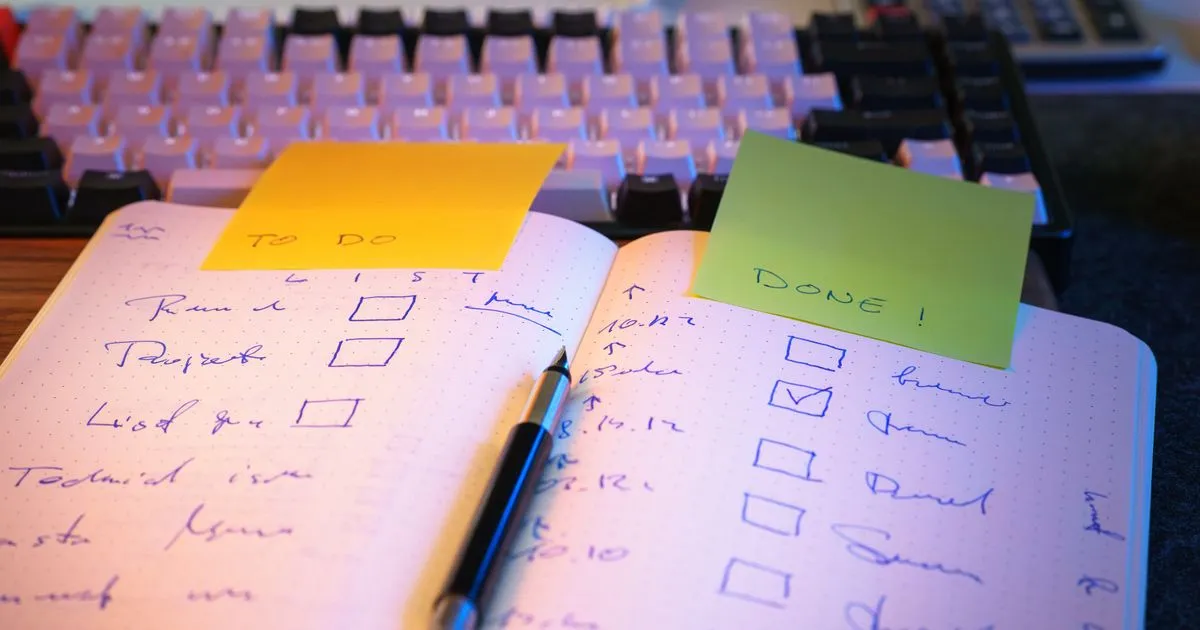 A step-by-step credit repair Canada checklist in a notebook