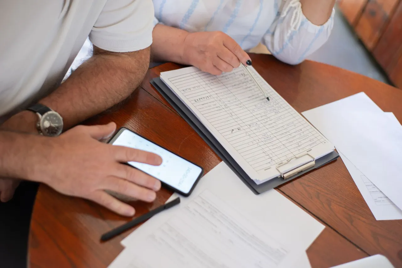 Alberta household adding up debts before consolidating