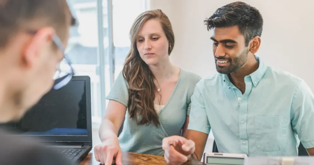 Couple reviewing credit options during a consumer proposal