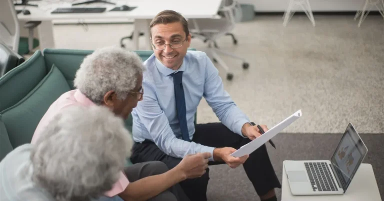 Credit counselling session comparing a debt management plan with a consolidation loan