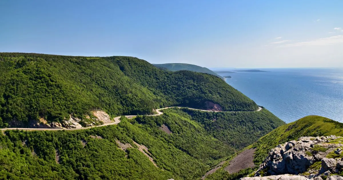 Debt consolidation Nova Scotia: the Cabot Trail winding along the Cape Breton coast