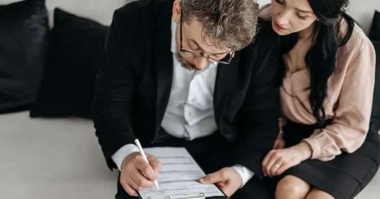 Do credit repair companies work: couple reviewing a credit repair contract